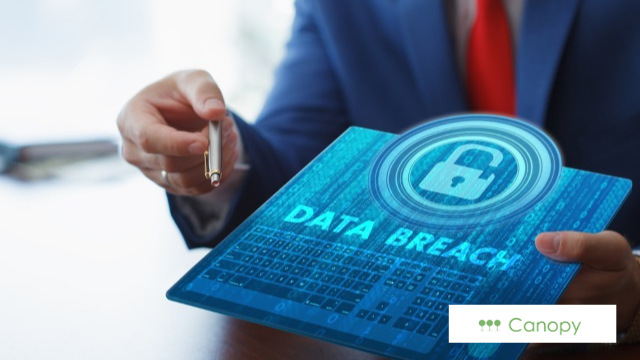 Suited man with data breach with a lock that is opened