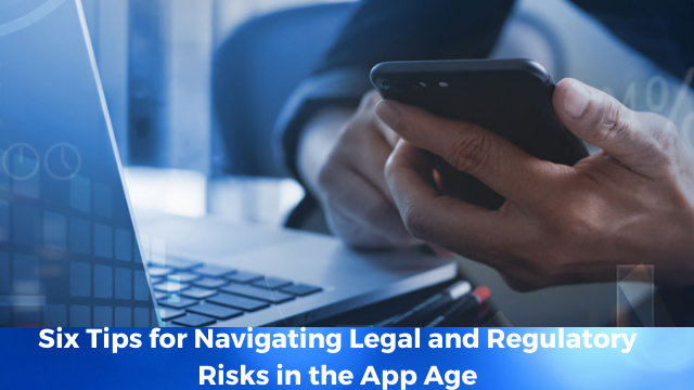 Hands holding a smartphone resting on a laptop keyboard:  6 tips for navigating legal & regulatory risk in the app age