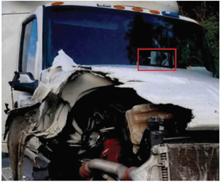 Expanded photo of truck after accident, blown up showing tablet