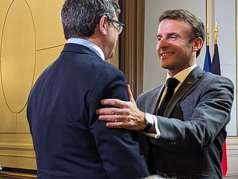 LeCun with Macron shaking hands and talking
