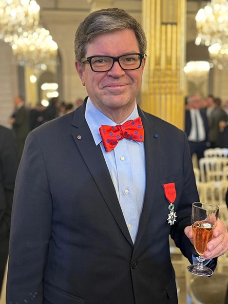 LeCun with bowtie and champagne