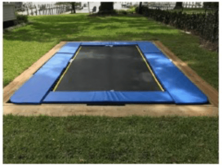 The same pit as above, covered with the trampoline and ready to use.