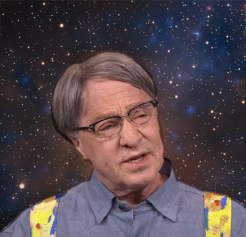 A photo of Ray Kurzweil wearing glasses, a blue shirt, and yellow suspenders. He is speaking against a background of stars in space.